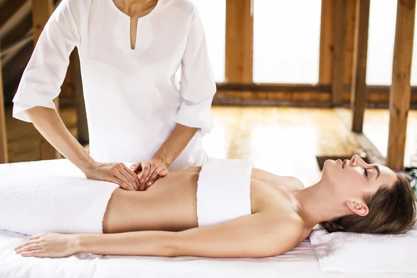 depositphotos 93290256 stock photo woman having abdomen massage - Escuela Kaizen